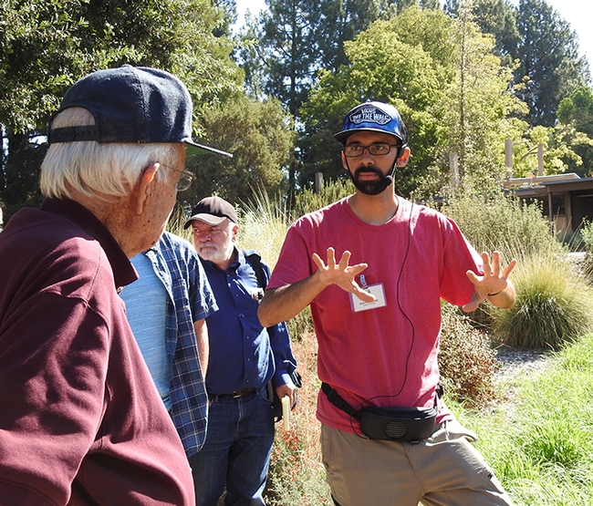 Entomologist Joel Hernandez stops to answer a question during the tour. (Photo by Kathy Keatley Garvey)
