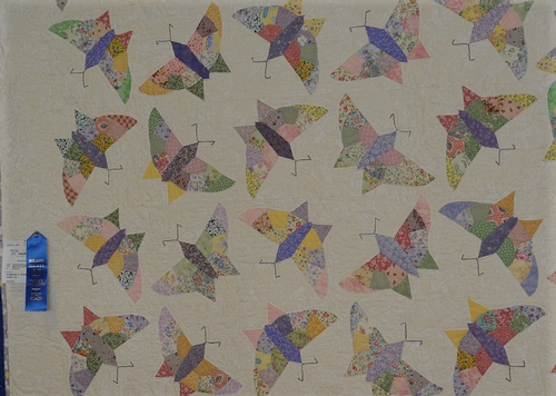 BUTTERFLY QUILT, made by Virginia Romero of Vallejo, is decorated with scores of butterflies. It is being exhibited in McComack Hall at the June 23-27 Solano County Fair, Vallejo. (Photo by Kathy Keatley Garvey)