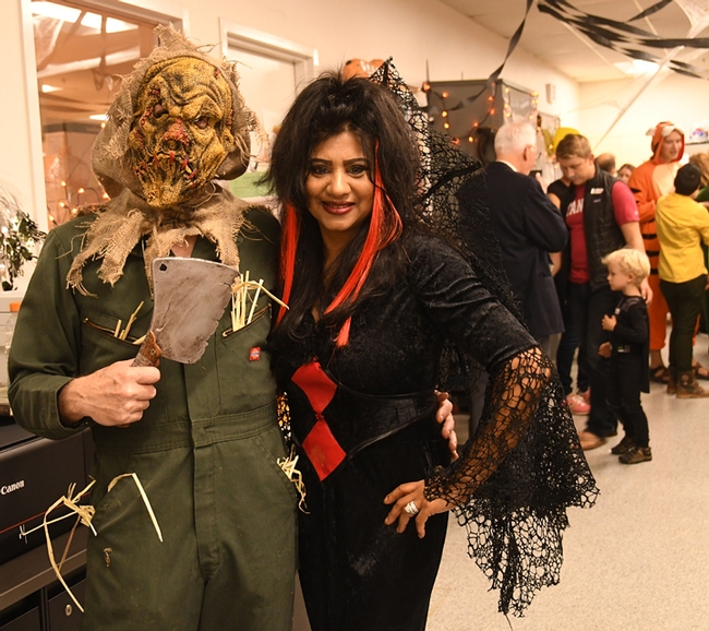 Bohart senior museum scientist Steve Heydon portrayed a scarecrow--that knife is fake--and his wife, Anita, a black widow spider. (Photo by Kathy Keatley Garvey)