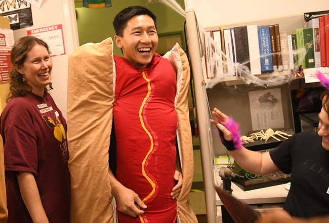 Student Jamie Fong came dressed as a hot dog. At left is Tabatha Yang, Bohart Museum outreach and public education coordinator, dressed as a 