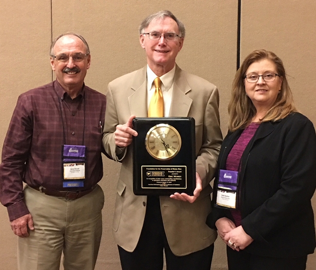 Eric Mussen (center) with Gene Brandi, president of the American Beekeeping Federation, and Joan Gunter, president of the Foundation for the Preservation of Honey Bees.