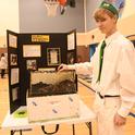 Ian Weber of the Vaca Valley 4-H Club, a second-year beekeeper, displays his project at the Solano County 4-H Project Skills Day. He won a showmanship award. (Photo by Kathy Keatley Garvey)