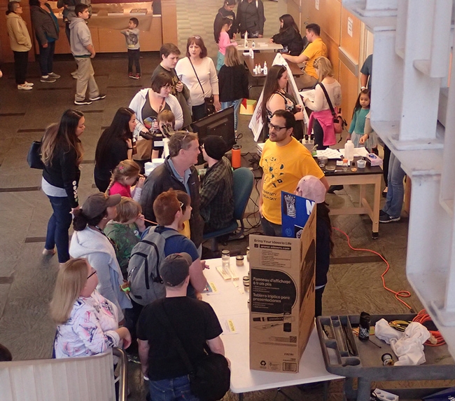 Bird's eye view of the nematode collection and nematologists staffing the display in the Sciences Laboratory Building. (Photo by Kathy Keatley Garvey)