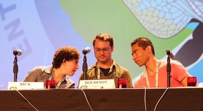 In this image from the 2016 national Linnaean Games championship round, UC Davis members (from left) Emily Bick, Brendon Boudinot confer with captain Ralph Washington Jr. (Photo by Chuck Fazio)