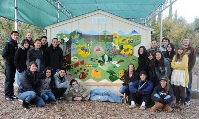 Here are the artists who created the mural. Instructor Sarah Dalyrumple is in the group on the right, front row left. (Photo by Kathy Keatley Garvey)
