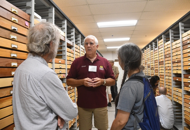 Jeff Smith, curator of the Bohart Museum's butterfly and moth section, talks about the specimens. (Photo by Kathy Keatley Garvey)