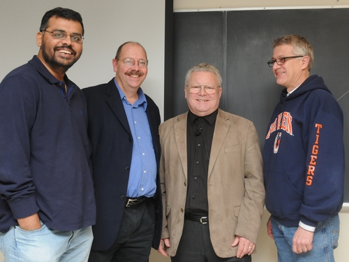 World-renowned organic chemist Wittko Francke (second from right) met with UC Davis researchers following his presentation on Wednesday at a UC Davis Department of Entomology seminar. From left are chemical ecologist Zain Syed of the Walter Leal lab; chemical ecologist and forest entomologist Steve Seybold of the USDA Forest Service, Pacific Southwest Research Station, Davis, and an affiliate of the UC Davis Department of Entomology; Wittko Francke; and chemical ecologist Walter Leal, professor and former chair of the UC Davis Department of Entomology. (Photo by Kathy Keatley Garvey)