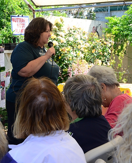 Tora Rocha, co-founder of the Pollinator Posse, addresses the crowd at the third annual butterfly summit at Annie's Annuals and Perennials, Richmond. (Photo by Kathy Keatley Garvey)