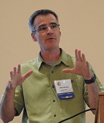 Co-chair Neal Williams addresses the crowd at the International Pollinator Conference. (Photo by Kathy Keatley Garvey)
