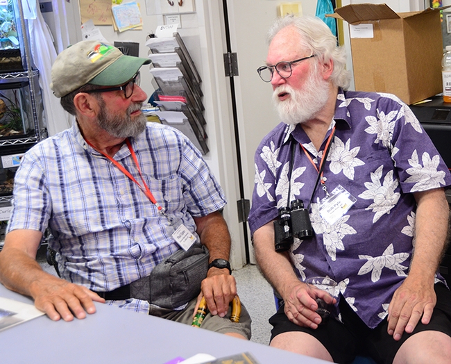 Legendary Lepidopterists Paul Opler (left), an octogenarian, and Robert Michael Pyle, a septuagenarian, chat during their visit to the Bohart Museum of Entomology. It was part of the Lepidopterists' Society's 68th annual conference. (Photo by Kathy Keatley Garvey)