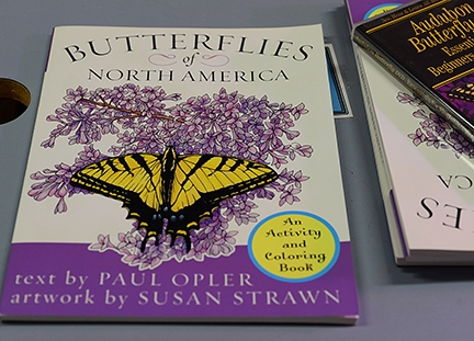 This is one of the books displayed at the Lepitopteran Society meeting. Author is Paul Opler; artist is Susan Strawn. (Photo by Kathy Keatley Garvey)
