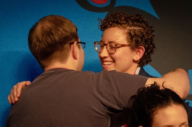 Linnaean Games Team (Bug Bowl) member Emily Bick received a congratulatory hug after the UC team won the national championship in 2018. (ESA Photo)