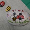 These rocks at the Bohart Museum of Entomology depict favorite insects: honey bees and ladybugs (lady beetles.) The larger rock, inspired by Valentine's Day, is titled 