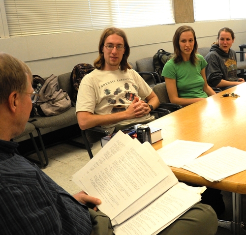 COACH Larry Godfrey, Extension entomologist with the UC Davis Department of Entomology, calls out questions during a practice session. The graduate students (from left) are Matan Shelomi, Meredith Cenzer and Emily Symmes. Not pictured is James Harwood. The team just won the Linnaean Games at the Pacific Branch of the Entomological Society of America and will now compete in the nationals. (Photo by Kathy Keatley Garvey)