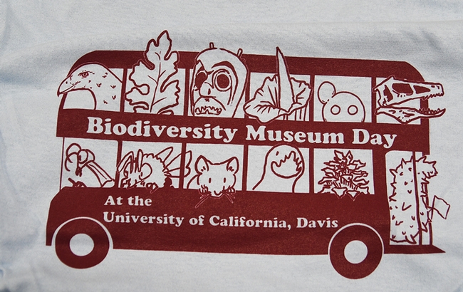 All aboard! The t-shirt design, by Ivana Li, shows organisms that visitors will see at the UC Davis Biodiversity Museum Day on Feb. 15. (Photo by Kathy Keatley Garvey)