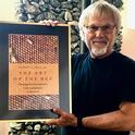 Eminent honey bee geneticist and biologist Robert E. Page Jr. with his new book, 