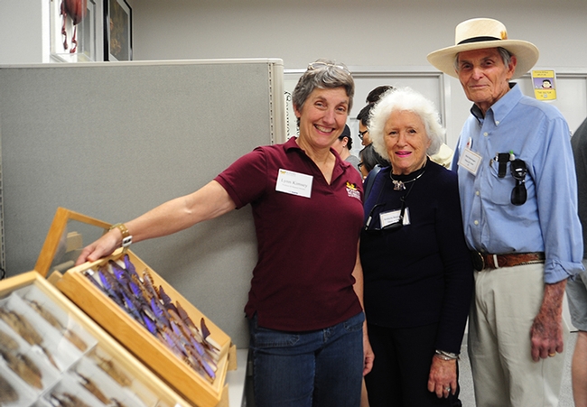 Lynn Kimsey (left), director of the Bohart Museum of Entomology and professor of entomology at UC Davis, shows Richard and Evelyne Rominger a display at the Bohart Museum on UC Davis Picnic Day, April 17, 2015. The Romingers are both UC Davis alumni. (Photo by Kathy Keatley Garvey)