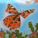 A painted lady, Vanessa cardui, flutters away in this prize-winning work of artist Roberto Valdez. He won best of show in the professional fine arts category, oils and acrylics, at the 2021 Dixon May Fair.