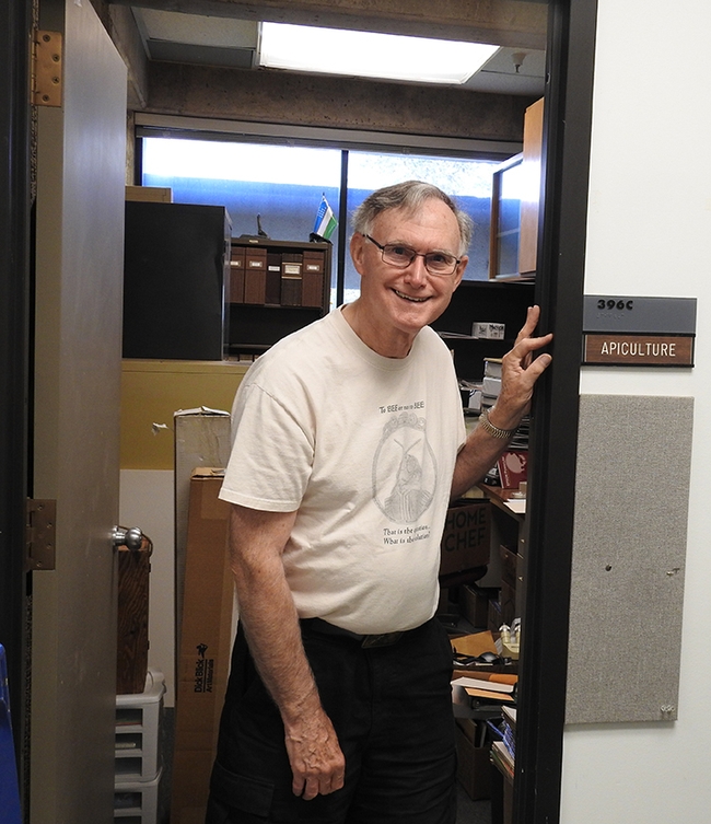 Extension apiculturist emeritus Eric Mussen stands by his office for the last time. This image was taken in September 2021. (Photo by Kathy Keatley Garvey)