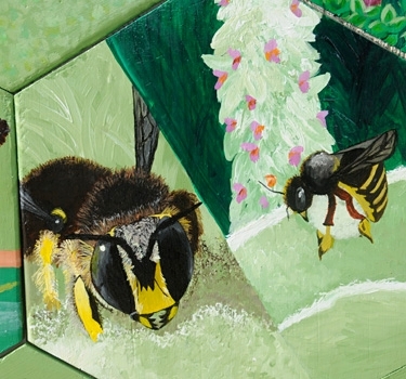 This ceramic-mosaic sculpture of a European wool carder bee, the work of former UC Davis student Christine Chen, appears on a mural in the UC Davis Bee Garden. (Photo by Kathy Keatley Garvey)