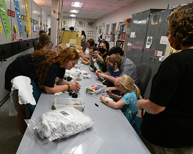 The Bohart Museum's family arts-and-crafts table, featuring how to make gall ghosts, was busy  throughout the open house, themed  