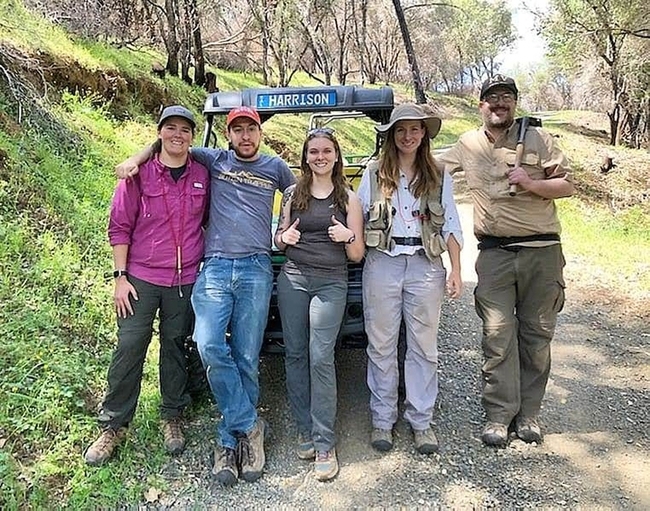 Five members of the Jason Bond lab, including postdoctoral scholar Lisa Chamberland, pose for a photo at the UC Quail Ridge Reserve, Napa County, in 2022. From left are Lacie Newton, Xavier Zahnle, Emma Jochim, Lisa Chamberland and Jim Starrett. Not pictured are the newest lab members Iris Bright and Megan Ma.