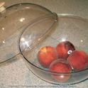 Peaches in a ripening bowl