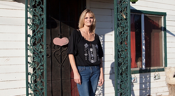 Mary Schaffer pictured in front of her home in the small community of Cameron Creek in the Central Valley. Photo by Kristine Diekman.