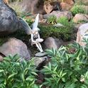 An angel (or fairy) sculpture creates a pleasant accent in this calming rock garden area. Debi Durham