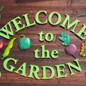This sign created by Kathy Mahannah welcomes visitors to the community garden at St. Timothy's Church in Gridley. Grace Mahannah