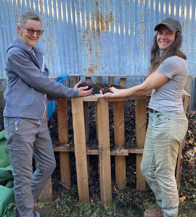 Grace Mahannah (at left) and Janel Luke of California Alliance for Community Composting at compost bin. Kathy Mahannah