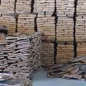 Cork sorted into piles in Alentejo, Portugal cork factory.  J.C. Lawrence