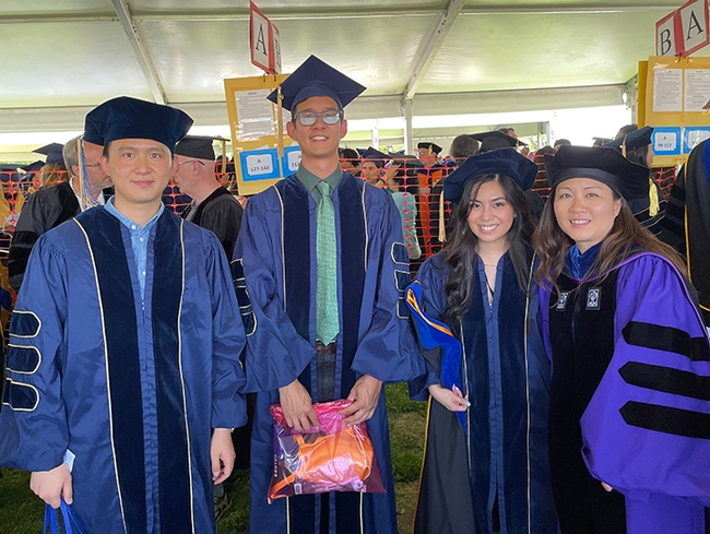 New PhDs from the Joanna Chiu lab gather for a photo. From left are Yao Cai, Kyle Lewald, Christine Tabuloc and Professor Joanna Chiu, vice chair of the UC Davis Department of Entomology and Nematology.