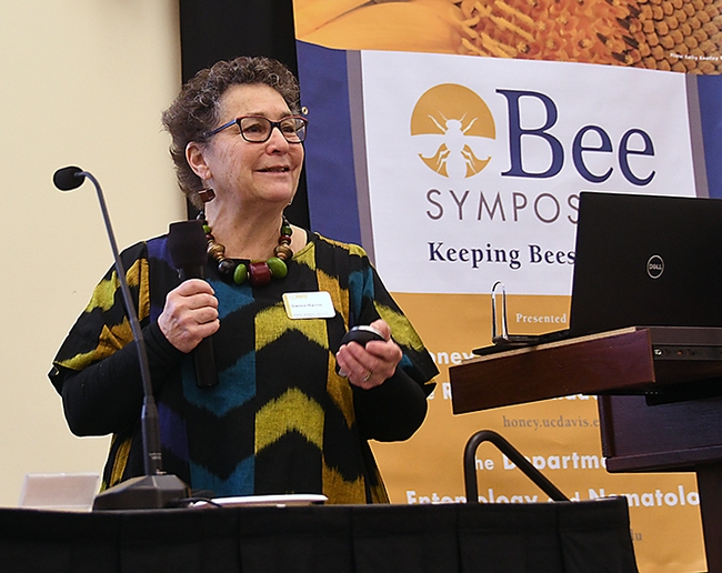 Amina Harris, as director of the UC Davis Honey and Pollination Center, speaking at the 2018 UC Davis Bee Symposium that she organized. (Photo by Kathy Keatley Garvey)