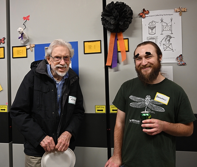 Bill Patterson, longtime butterfly collector and strong supporter of the Bohart Museum, chats with Bohart collection manager Brennen Dyer. (Photo by Kathy Keatley Garvey)