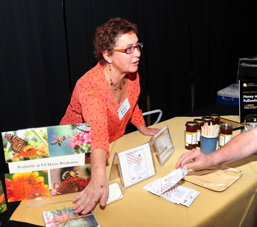 Amina Harris, executive director of the UC Davis Honey and Pollination Center, located in the Robert Mondavi Institute for Wine and Food Science, offered honey to the crowd and displayed note cards of pollinators photographed by Kathy Keatley Garvey. The note cards are available at the UC Davis Bookstore.