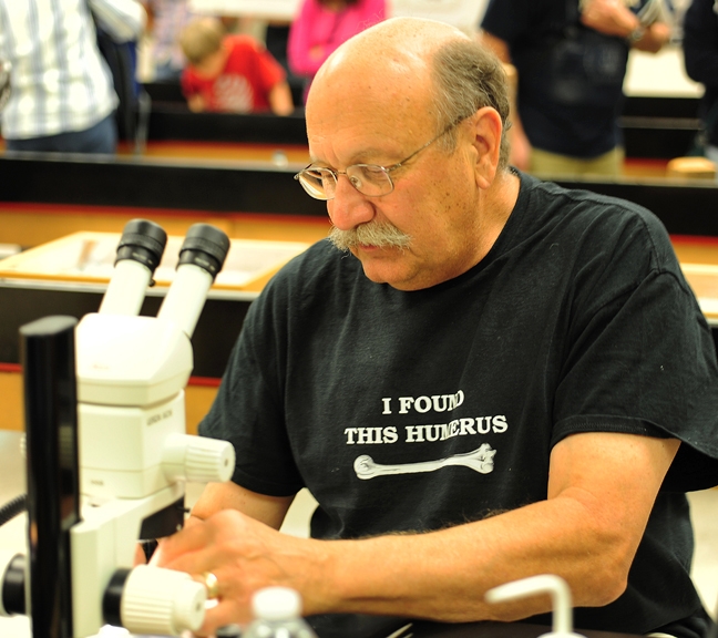 Forensic entomologist Robert Kimsey at his display in Briggs Hall