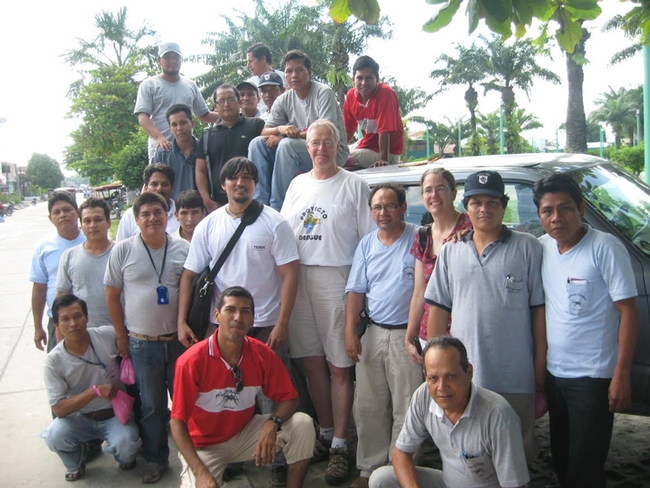 Thomas Scott (second row, center) and his field site director Amy Morrison with their mosquito collector and data management teams in Iquitos. (Photo courtesy of Thomas Scott lab)
