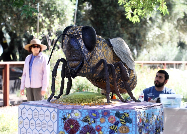 Miss Bee Haven, a mosaic ceramic of a worker bee by artist Donna Billick, anchors the bee haven. It was funded by Wells Fargo.(Photo by Kathy Keatley Garvey)