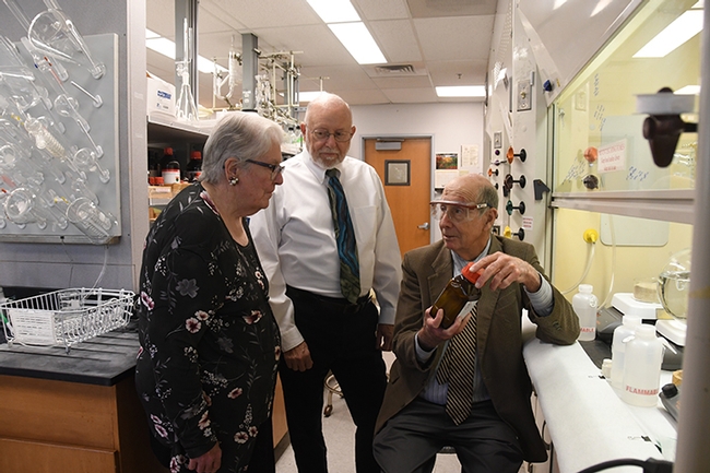 Bruce Hammock (right), distinguished professor at UC Davis, talks about the pending human clinical trials with Bev Anderson, president of the Western Neuropathy Association and Darrell O'Sullivan, treasurer. Some 10 percent of the population show symptoms of neuropathy. (Photo by Kathy Keatley Garvey)