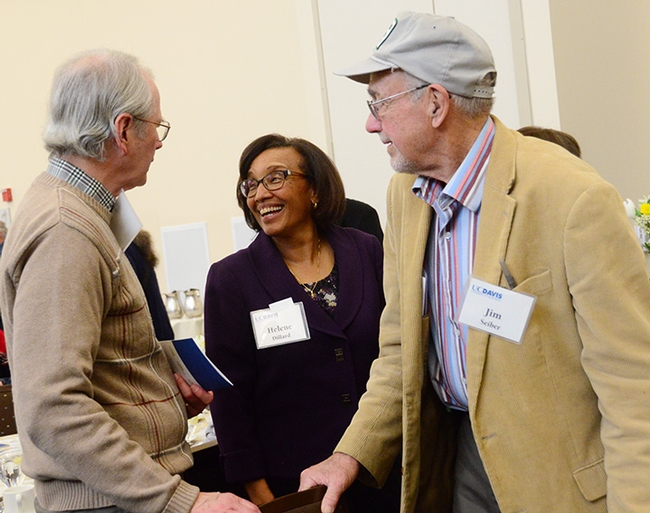Helene Dillard, dean  of the UC Davis College of Agricultural and Environmental Sciences, shares a laugh with Gary Smith (left), emeritus professor of food science,  and Jim Seiber, emeritus professor of environmental toxicology. (Photo by Kathy Keatley Garvey)