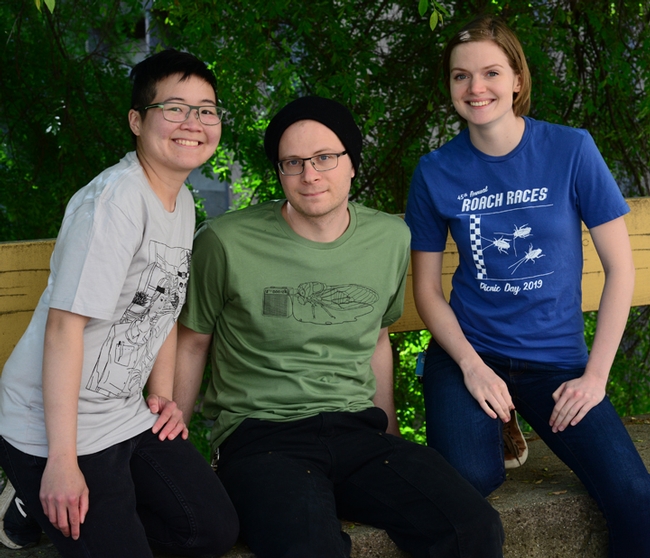 Showing winning entomology shirts are (from left) Ivana Li, UC Davis staff research associate and a UC Davis graduate in entomology; nematolgist and graduate student  Corwin Parker of the Steve Nadler lab; and graduate student Jill Oberski of the Phil Ward lab. Oberski created the American Gothic t-shirt and the roach races t-shirt, while Parker designed the cicada t-shirt. Li is a strong supporter and also designed a t-shirt for the contest.(Photo by Kathy Keatley Garvey)