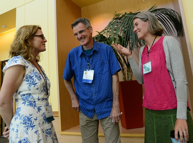 Keynote speaker Lynn Dicks (left)  of the School of Biological Sciences, University of East Anglia, England, chats with conference co-chair Neal Williams and speaker Rachel Vannette, both of the UC Davis Department of Entomology and Nematology. (Photo by Kathy Keatley Garvey)