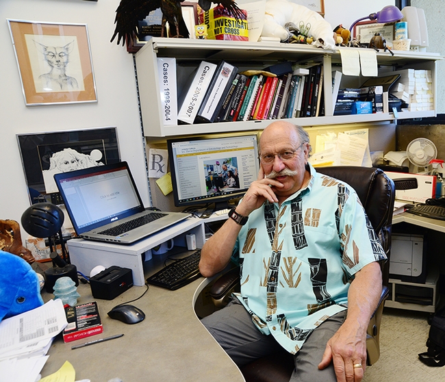 Forensic entomologist Robert Kimsey in his office in Briggs Hall. He serves as the master advisor to the animal biology major and advises the UC Davis Entomology Club. (Photo by Kathy Keatley Garvey)
