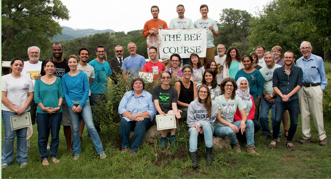 In this 2015 Bee Course class photo, Charlie Nicholson (top, far left) holds the sign. In the second row, far left, is co-instructor Robbin Thorp, UC Davis distinguished emeritus professor of entomology. Nicholson is the winner of the inaugural Robbin Thorp Memorial First-Bumble-Bee-of-the-Year Contest, sponsored by the Bohart Museum of Entomology. (Photo courtesy of The Bee Course)