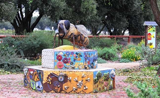 This worker bee sculpture by Donna Billick of Davis, anchors the Häagen-Dazs Honey Bee Haven on Bee Biology Road. (Photo by Kathy Keatley Garvey)