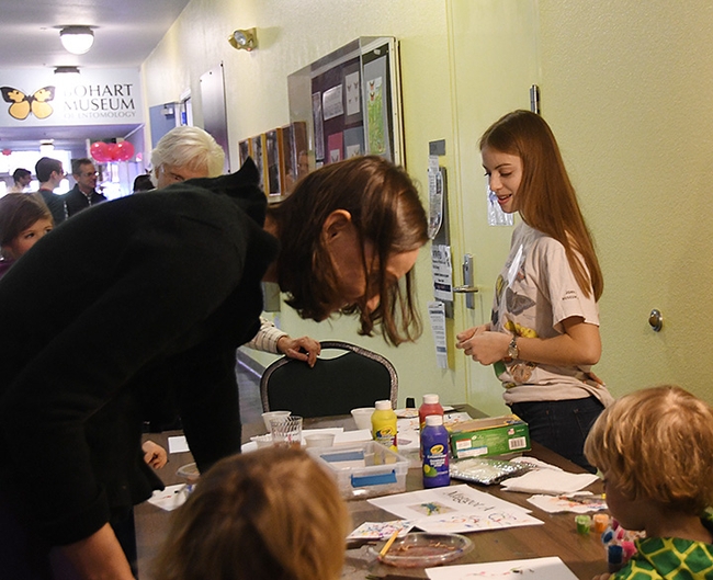 Gwen Erdosh volunteering at a Bohart Museum of Entomology open house in 2019, the year she enrolled as an entomology major. (Photo by Kathy Keatley Garvey)