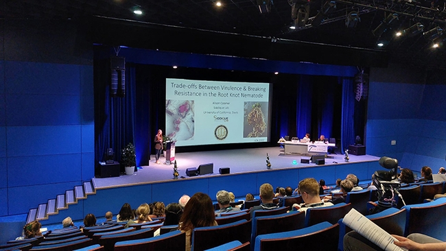 UC Davis doctoral student Alison Coomer presents her worldwide winning video presentation, “Trade-Offs Between Virulence and Breaking Resistance in Root-Knot Nematode” at the Seventh International Congress of Nematology meeting.