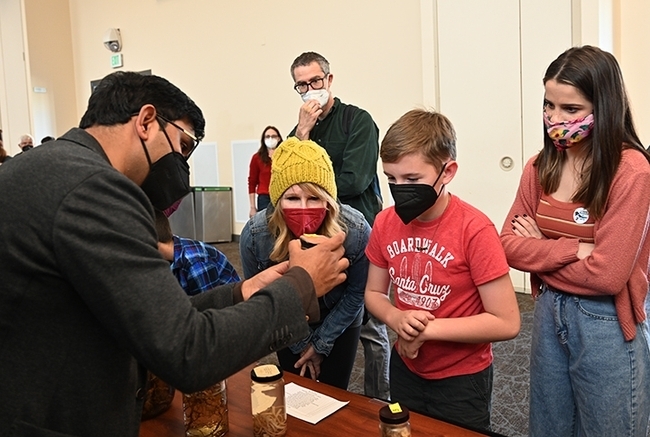 Nematologist Shahid Siddique, assistant professor, UC Davis Department of Entomology and Nematology, interacts with visitors at the 2021 UC Davis Biodiversity Day. (Photo by Kathy Keatley Garvey)