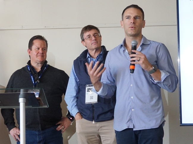 Danny Bernstein speaks and gestures during press conference